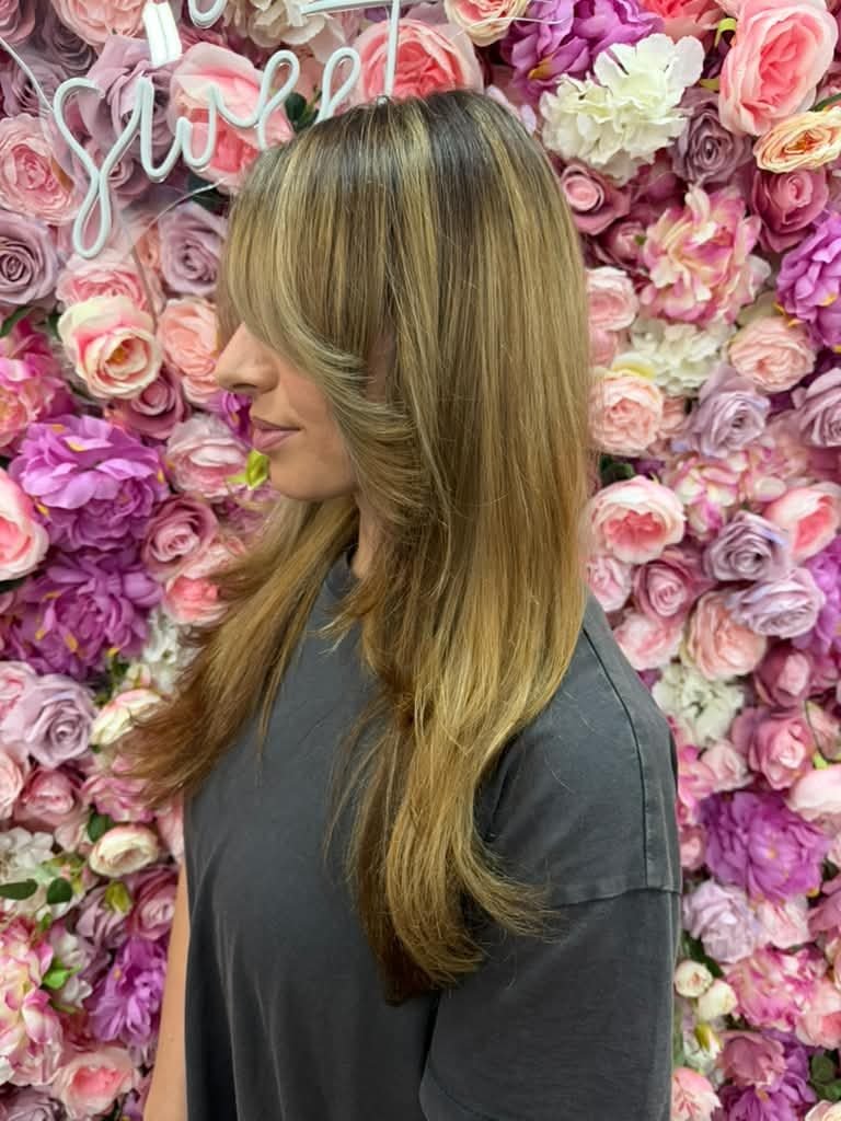 Long bronde layers with curtain bangs